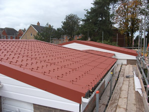 re-roofed 20 bungalows and out-buildings